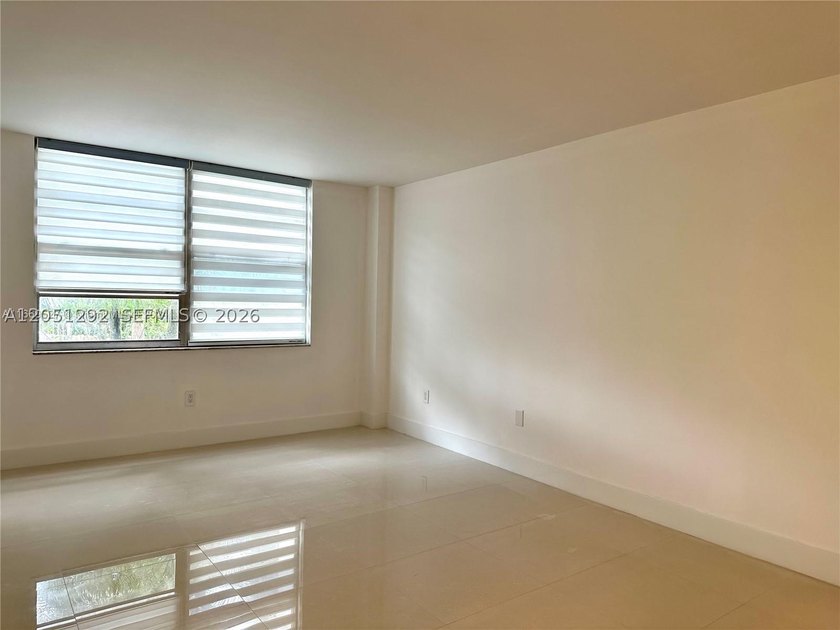 This spacious 2-bed, 2-bath condo is move-in ready and waiting - photo 11