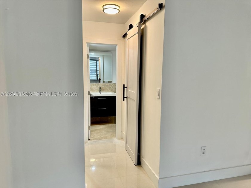 This spacious 2-bed, 2-bath condo is move-in ready and waiting - photo 12
