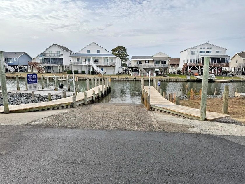 Discover modern coastal living in this stunning 3-bedroom - photo 26