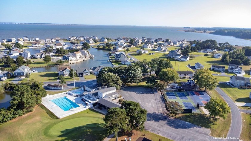 Discover modern coastal living in this stunning 3-bedroom - photo 42