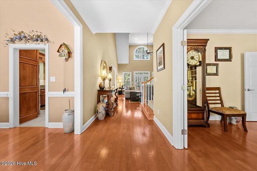 Nestled on a beautifully landscaped 0.70-acre golf-front lot - photo 11