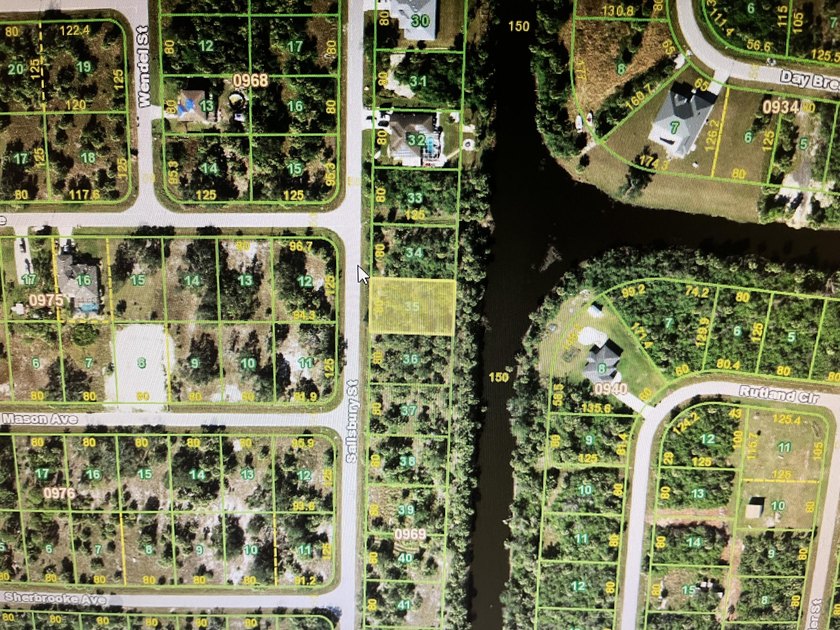 Beautiful lot in the water (canal) with newer homes around - photo 2