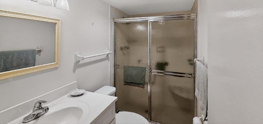 This quaint 55+ condo features white oak engineered hardwood - photo 4