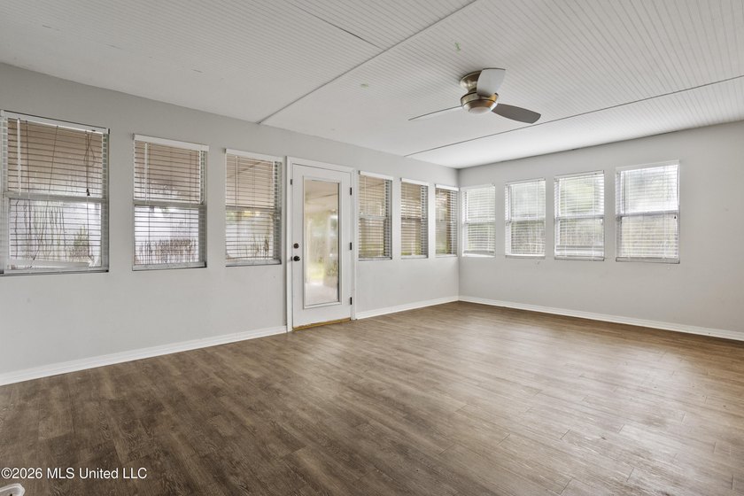 This charming home features a fenced backyard with a saltwater - photo 13