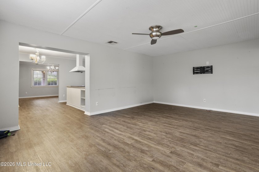 This charming home features a fenced backyard with a saltwater - photo 14