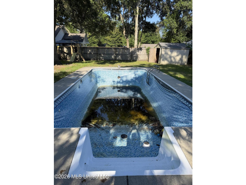This charming home features a fenced backyard with a saltwater - photo 25