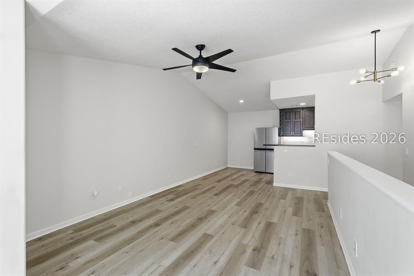 Extensively renovated in 2023, this second-floor end unit offers - photo 17