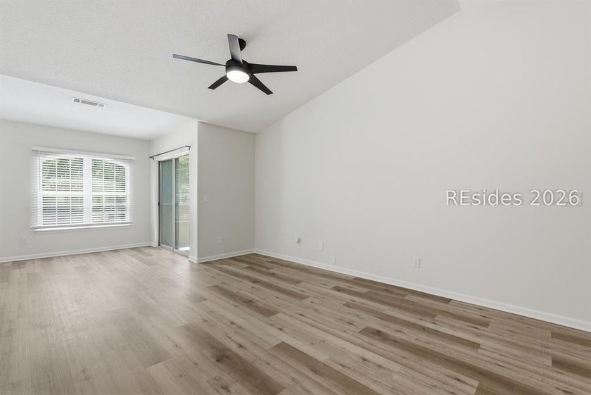 Extensively renovated in 2023, this second-floor end unit offers - photo 20