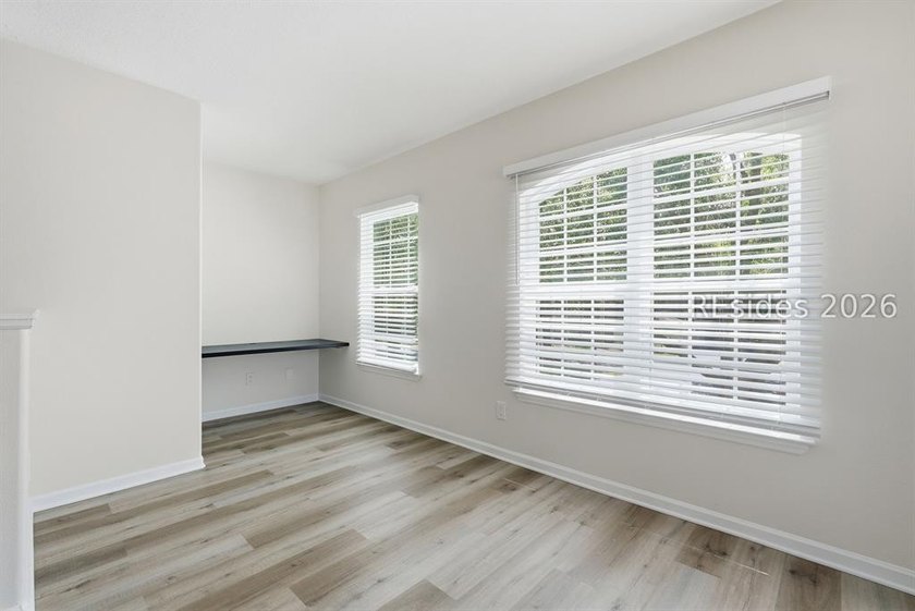 Extensively renovated in 2023, this second-floor end unit offers - photo 22