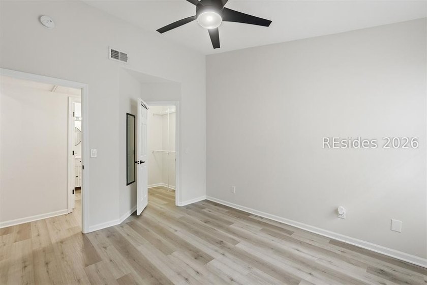 Extensively renovated in 2023, this second-floor end unit offers - photo 32