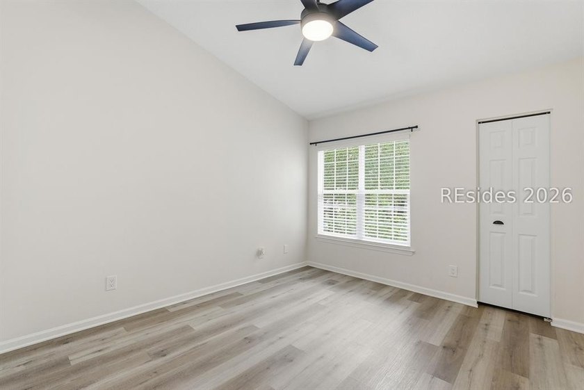 Extensively renovated in 2023, this second-floor end unit offers - photo 33