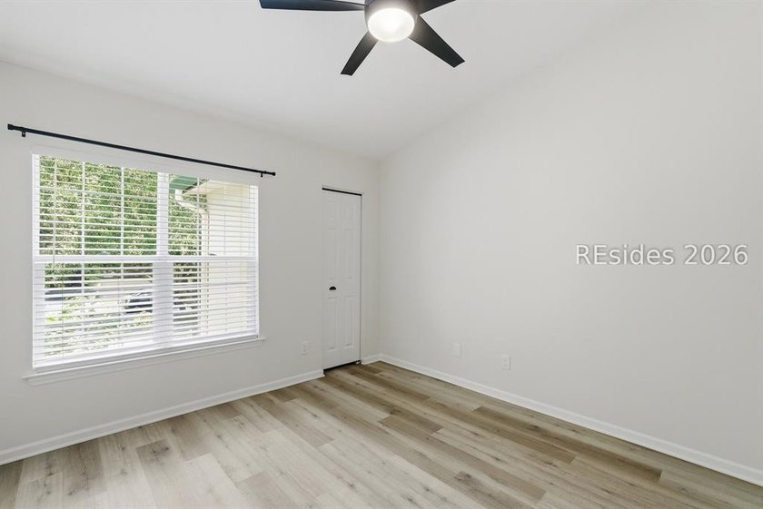 Extensively renovated in 2023, this second-floor end unit offers - photo 35