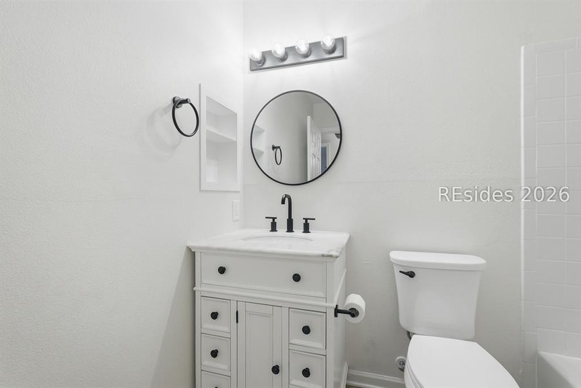 Extensively renovated in 2023, this second-floor end unit offers - photo 38