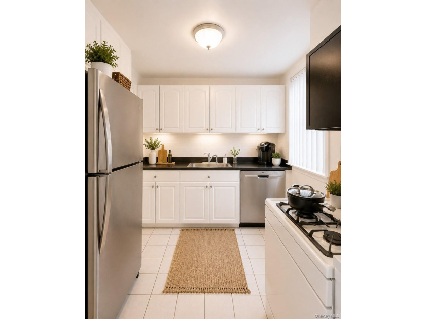 Welcome home to this sun-filled second-floor CORNER unit in a - photo 5