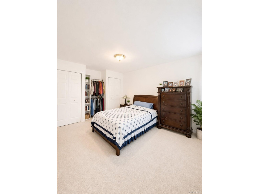 Welcome home to this sun-filled second-floor CORNER unit in a - photo 6