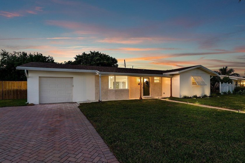Welcome to this charming three-bedroom, two-bathroom - photo 43