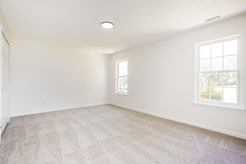 This fully refreshed 4-bedroom, 2.5-bath home with a 2-car - photo 11