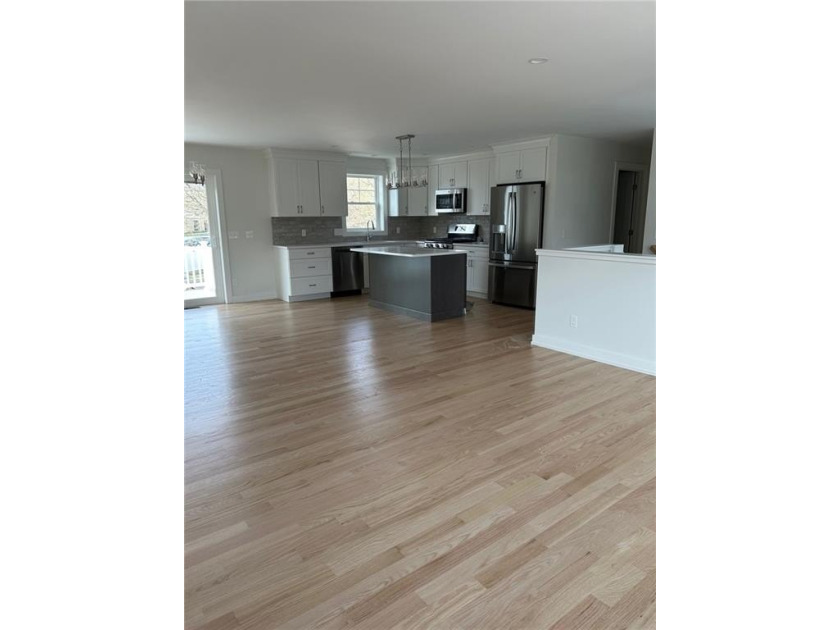 This brand new new, unique raised-ranch style home, located at - photo 2
