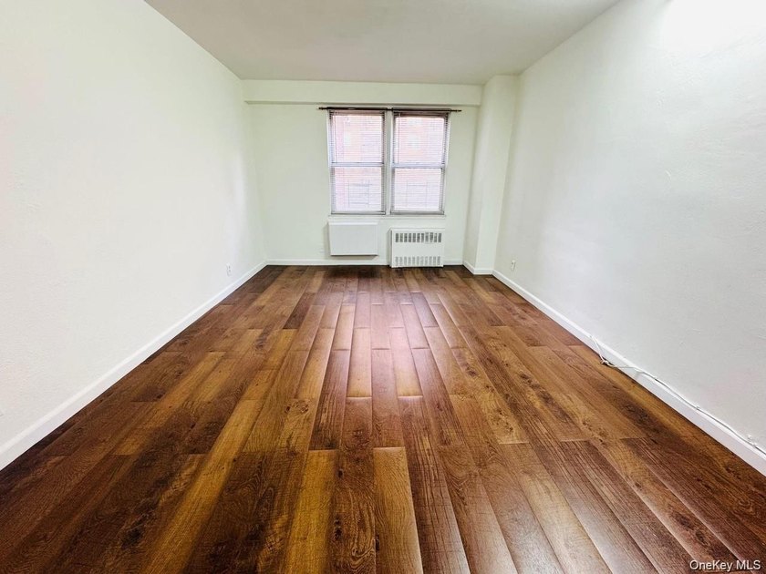 Renovated 2-bedroom co-op in Downtown Flushing-move-in ready - photo 6