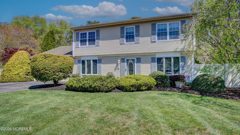 Welcome to this inviting 3-4 bedroom, 2.5-bath colonial tucked - photo 2