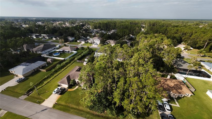 Discover a fantastic opportunity with this .23-acre wooded lot - photo 6