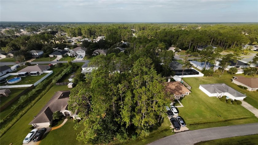 Discover a fantastic opportunity with this .23-acre wooded lot - photo 8
