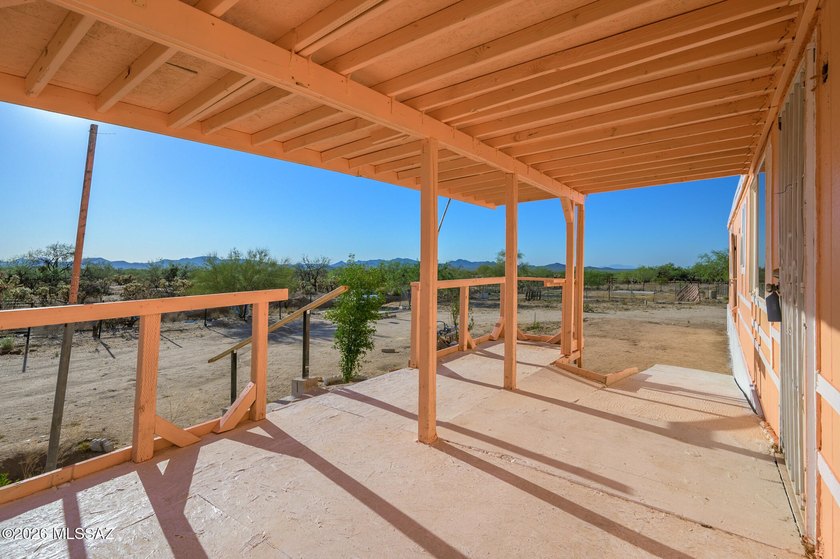 Escape the city to this remodeled 3BD/2BA home featuring nearly - photo 3