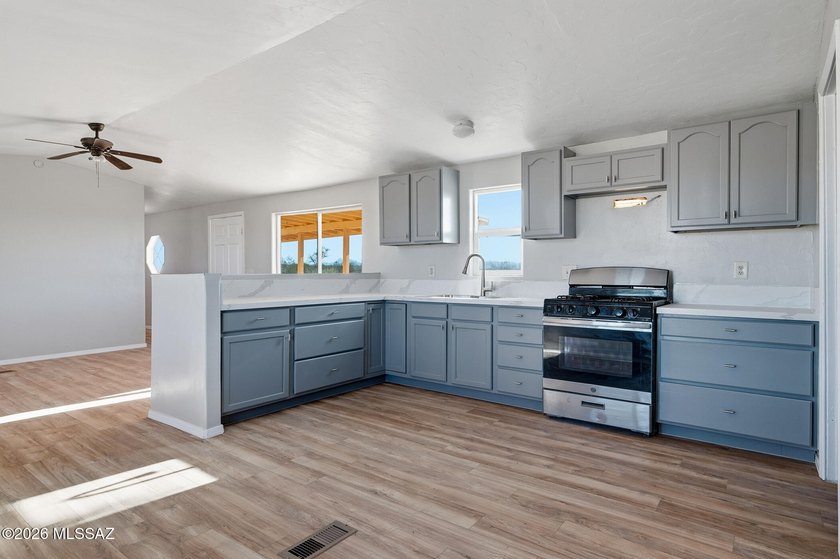 Escape the city to this remodeled 3BD/2BA home featuring nearly - photo 7