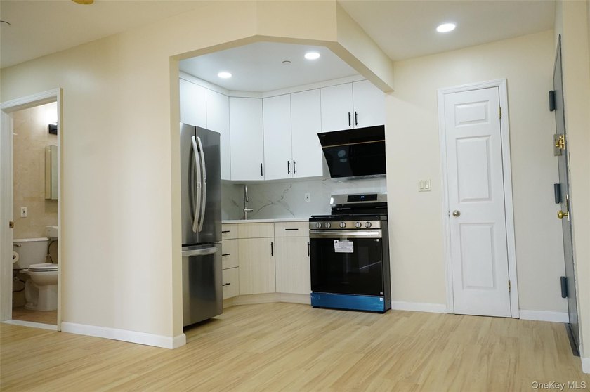 Prime Woodside location. This elevator condominium is - photo 8