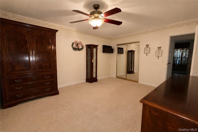 Set on a 60x100 lot in The Forest City section of Wantagh in - photo 15