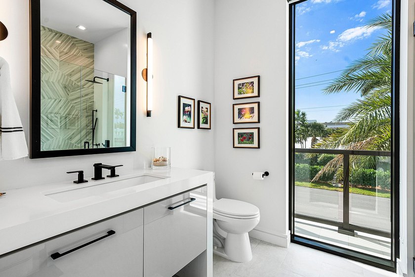 This exceptional waterfront residence at 344 Venetian Drive in - photo 24