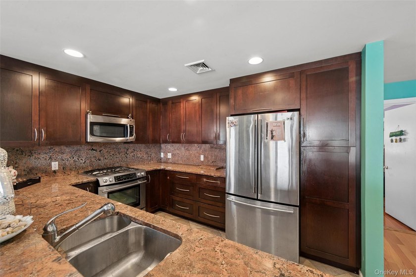 Experience Beach living in this stunning corner oceanfront - photo 20