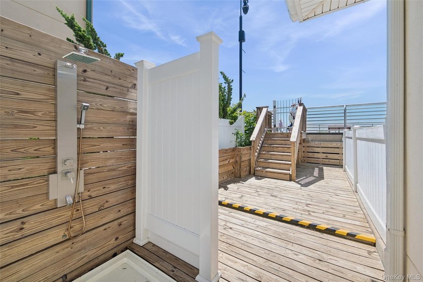 Experience Beach living in this stunning corner oceanfront - photo 34