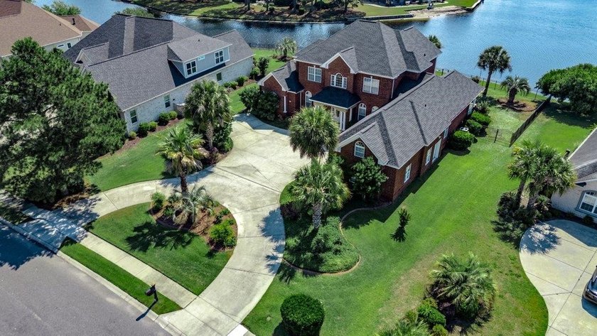 Luxury Waterfront Living with Private Pool in Plantation Lakes! - photo 2