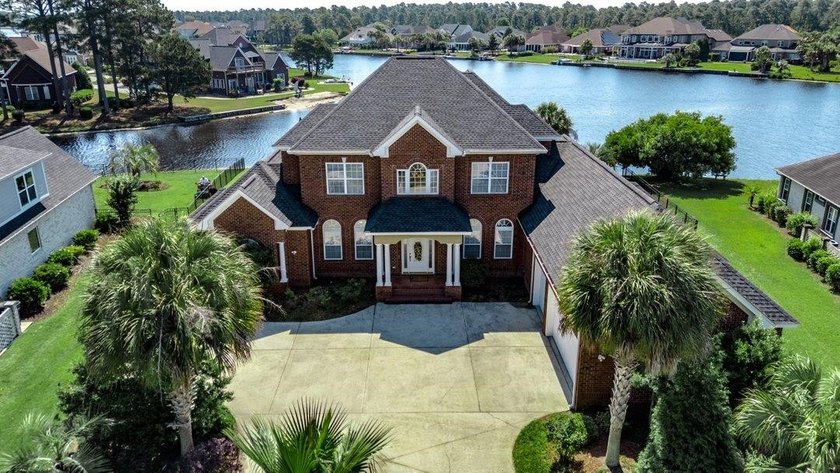 Luxury Waterfront Living with Private Pool in Plantation Lakes! - photo 4