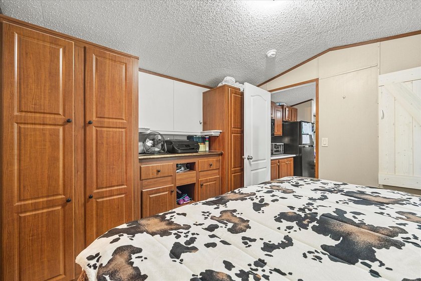 Escape to your own slice of paradise in the sought-after, gated - photo 13