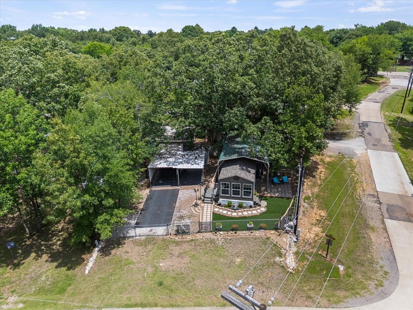 Escape to your own slice of paradise in the sought-after, gated - photo 18