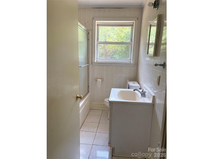 Welcome to the Classic 1950's Brick Ranch. This home has the - photo 11