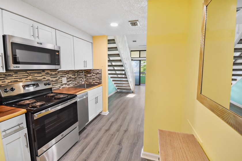 Experience coastal living at its finest in this beautifully - photo 6