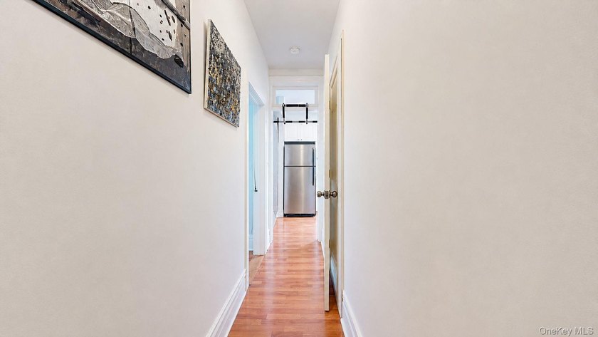 Perched on the top floor of a charming and meticulously - photo 7