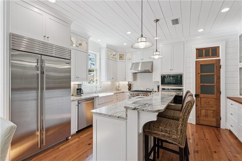 Welcome to an extraordinary custom beach cottage in the coveted - photo 12
