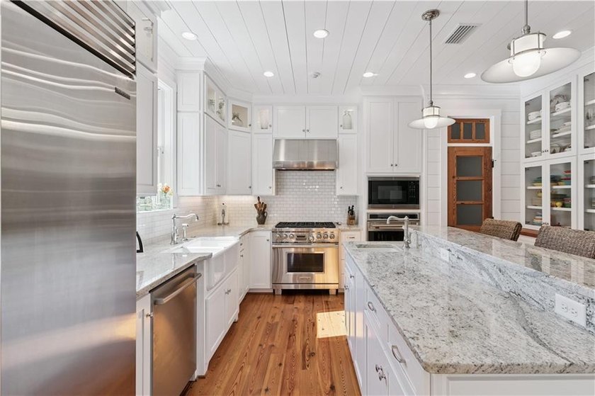 Welcome to an extraordinary custom beach cottage in the coveted - photo 13