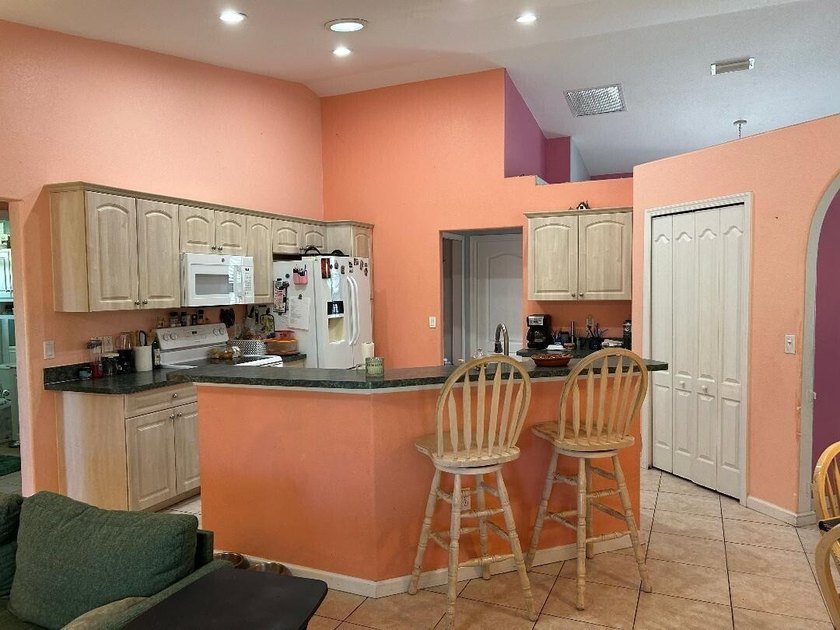 Home is being sold AS IS!! The roof is original, as well as the - photo 13