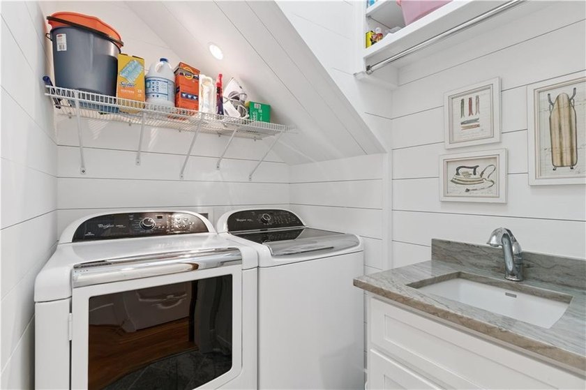 Welcome to an extraordinary custom beach cottage in the coveted - photo 17