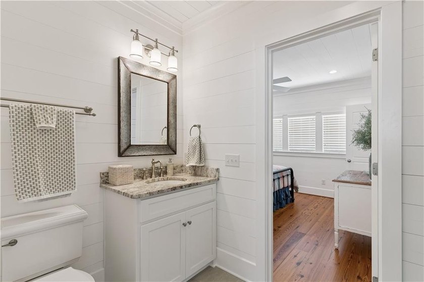 Welcome to an extraordinary custom beach cottage in the coveted - photo 33