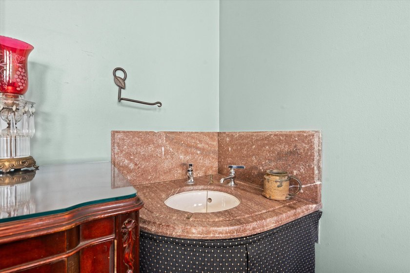 Step into timeless elegance with this beautifully preserved - photo 14