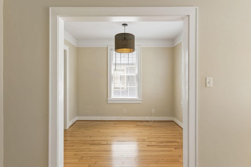 Full of charm, natural light, and future potential, this updated - photo 8