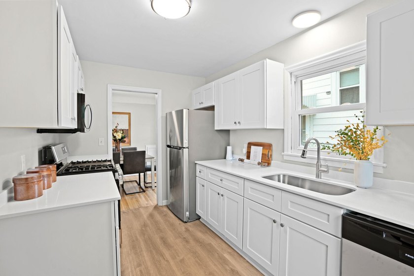 Fresh renovations and a thoughtful layout make this 3-bedroom - photo 5