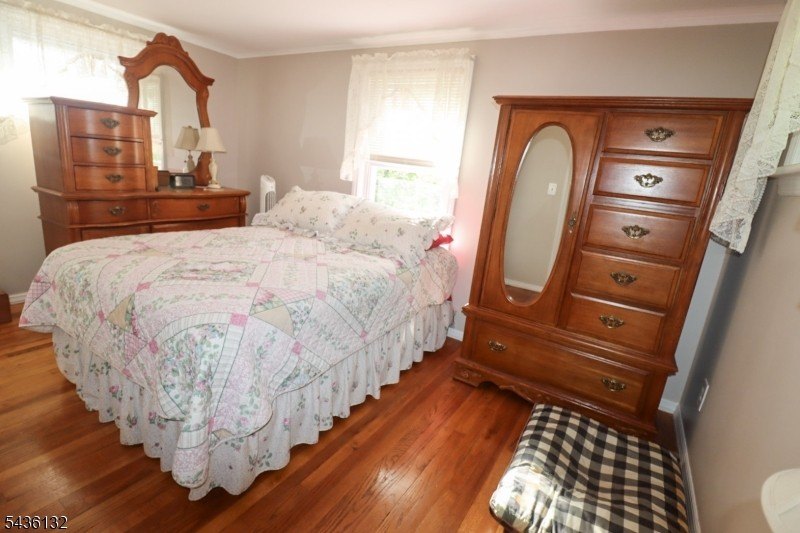 Charming custom-built Cape Cod home nestled on a prime corner - photo 13