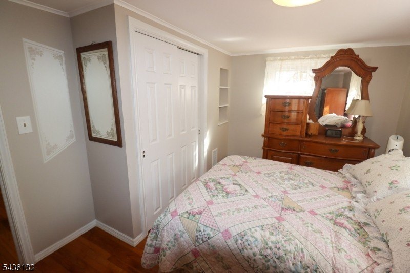 Charming custom-built Cape Cod home nestled on a prime corner - photo 14